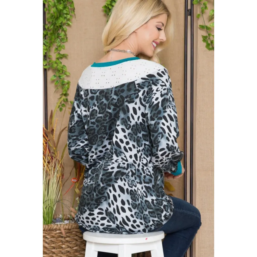 Celeste Full Size Animal Print Eyelet V-Neck Top