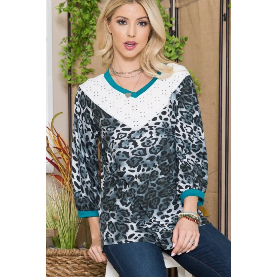 Celeste Full Size Animal Print Eyelet V-Neck Top